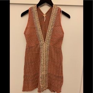 Free People sleeveless sweater/Baby doll top